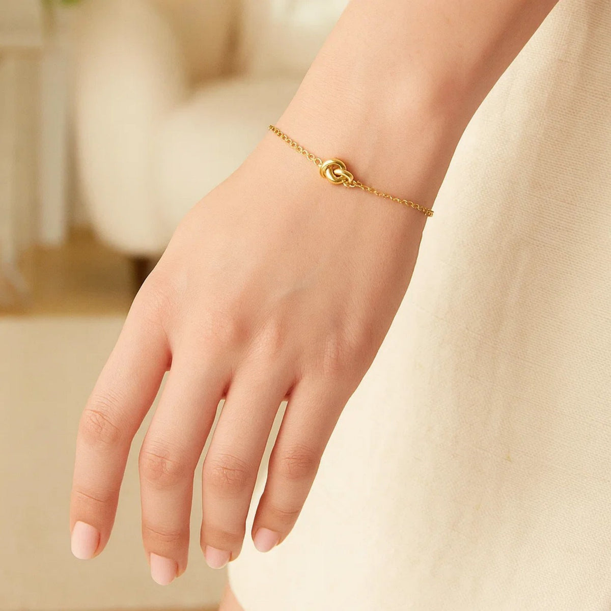 Polished Knot Chain Bracelet in 14K Yellow Gold, worn
