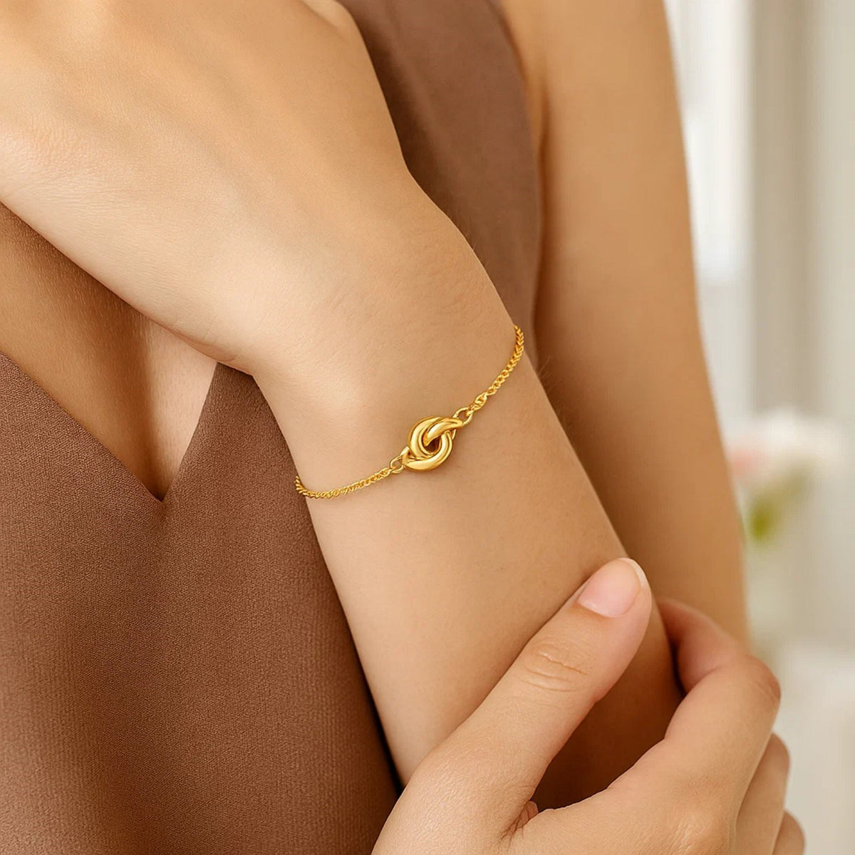 Polished Knot Chain Bracelet in 14K Yellow Gold, worn