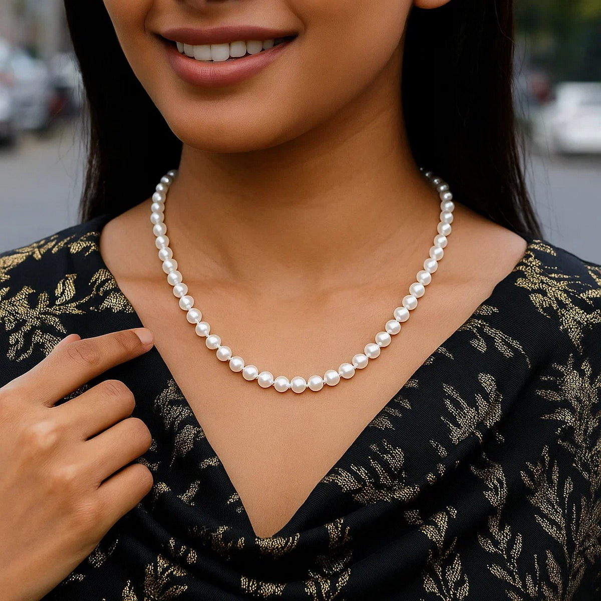 White Freshwater Pearl Strand Necklace in 14K Yellow Gold, worn