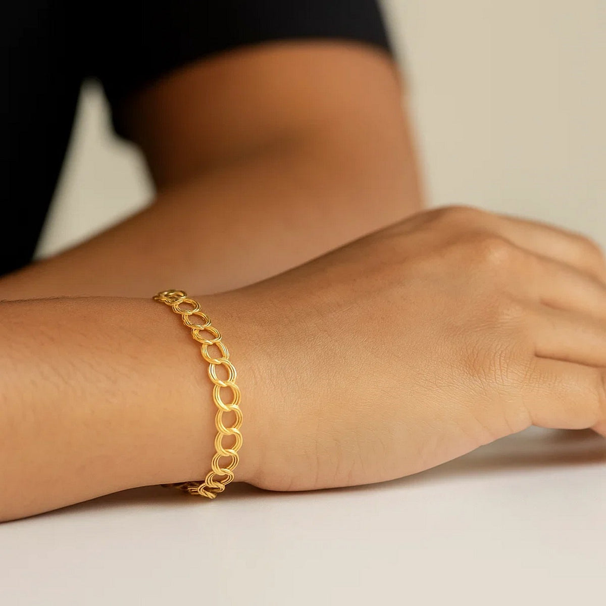 Triple Link Charm Bracelet in 14K Yellow Gold, worn