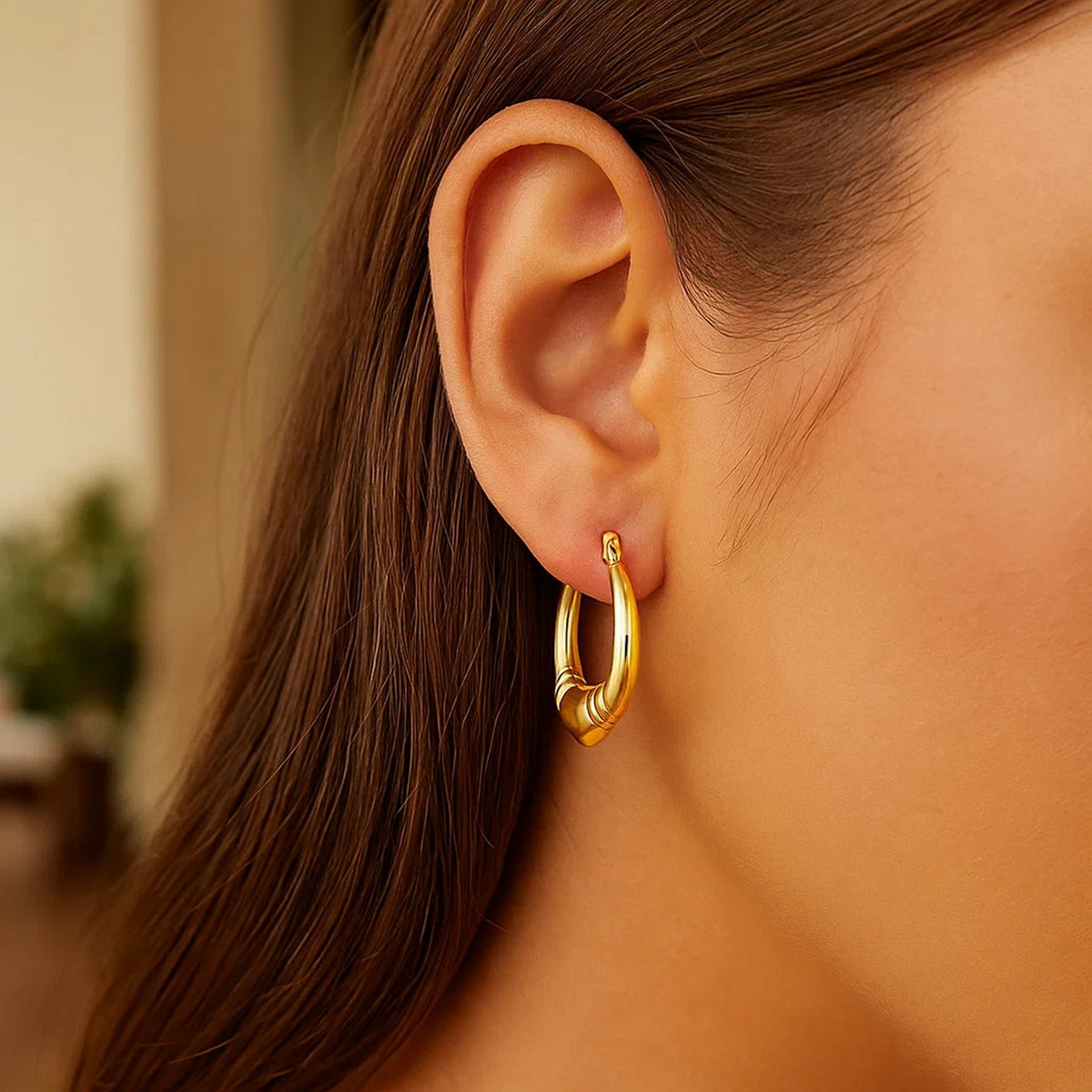 Ribbed Heart Hoop Earrings in 14K Yellow Gold, worn