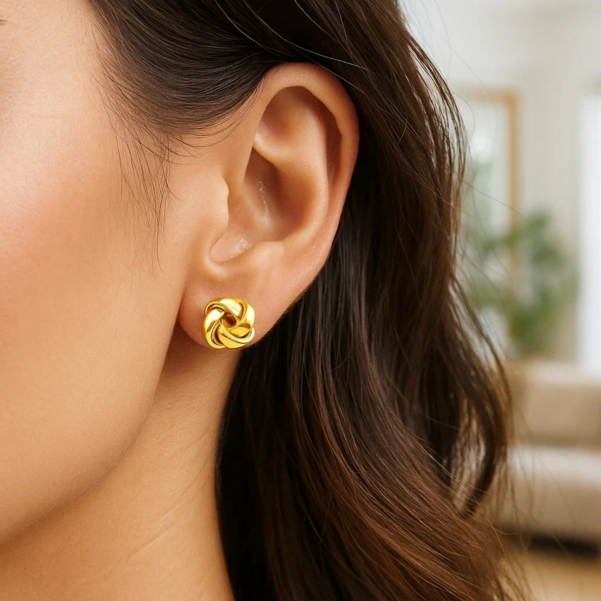 Classic Love Knot Stud Earrings in 14K Yellow Gold, worn