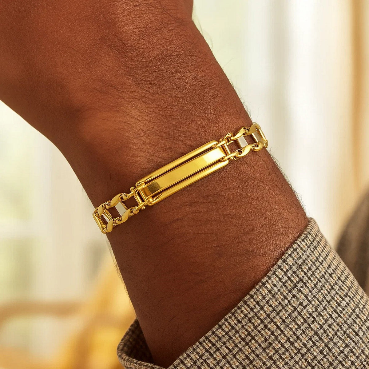 Men's Polished Bar Link Bracelet in 14K Two-Tone Gold, worn