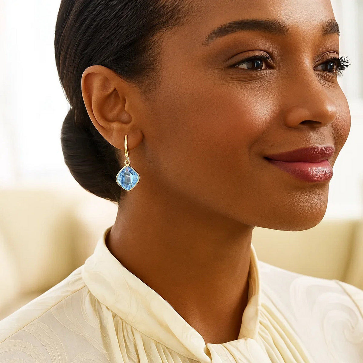 Blue Topaz Cushion Drop Earrings in 14K Yellow Gold, worn