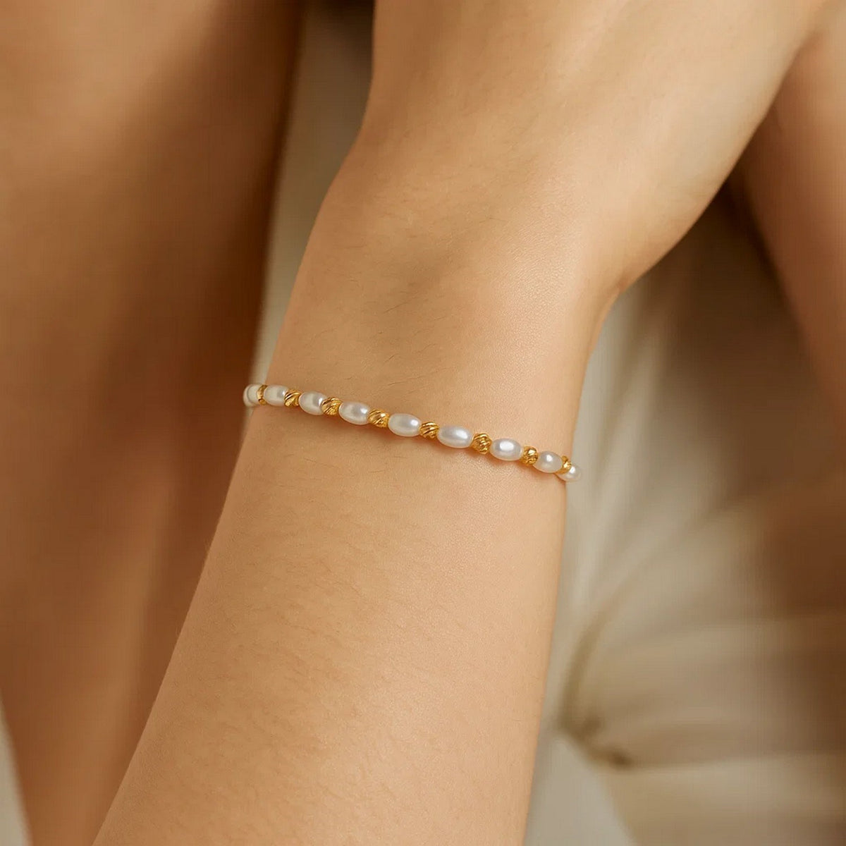 Faceted Bead and Freshwater Pearl Bracelet in 14K Yellow Gold, worn
