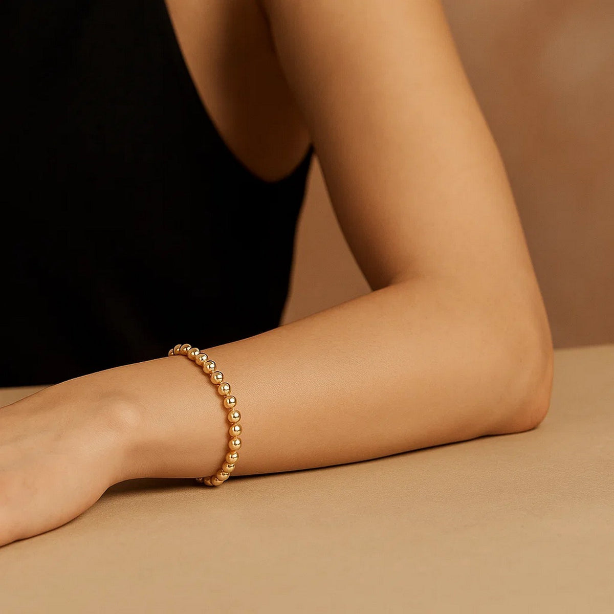 Polished Bead Bracelet in 14K Yellow Gold, worn