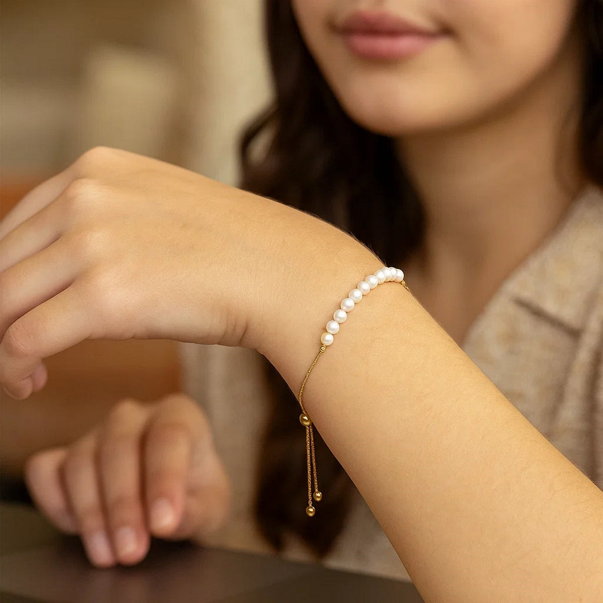 Adjustable Pearl Friendship Bracelet in 14K Yellow Gold, worn