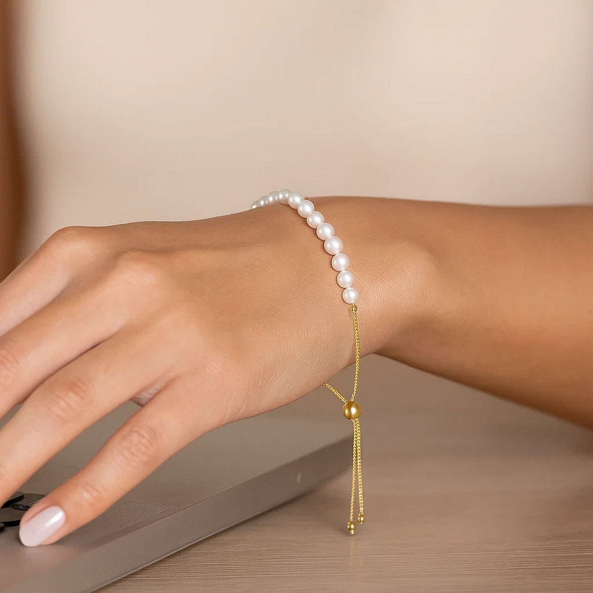 Adjustable Pearl Friendship Bracelet in 14K Yellow Gold, worn