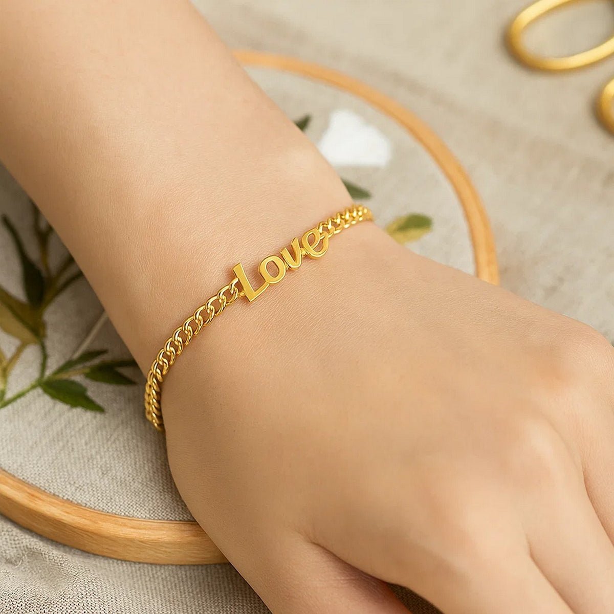 Script Love Curb Chain Bracelet in 14K Yellow Gold, worn