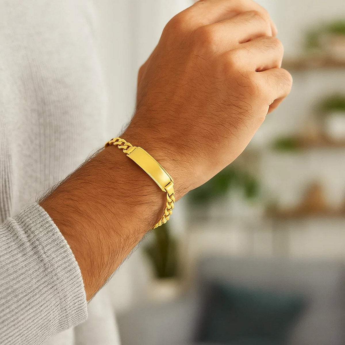 Men's Cuban Link ID Bracelet in 14K Yellow Gold, worn