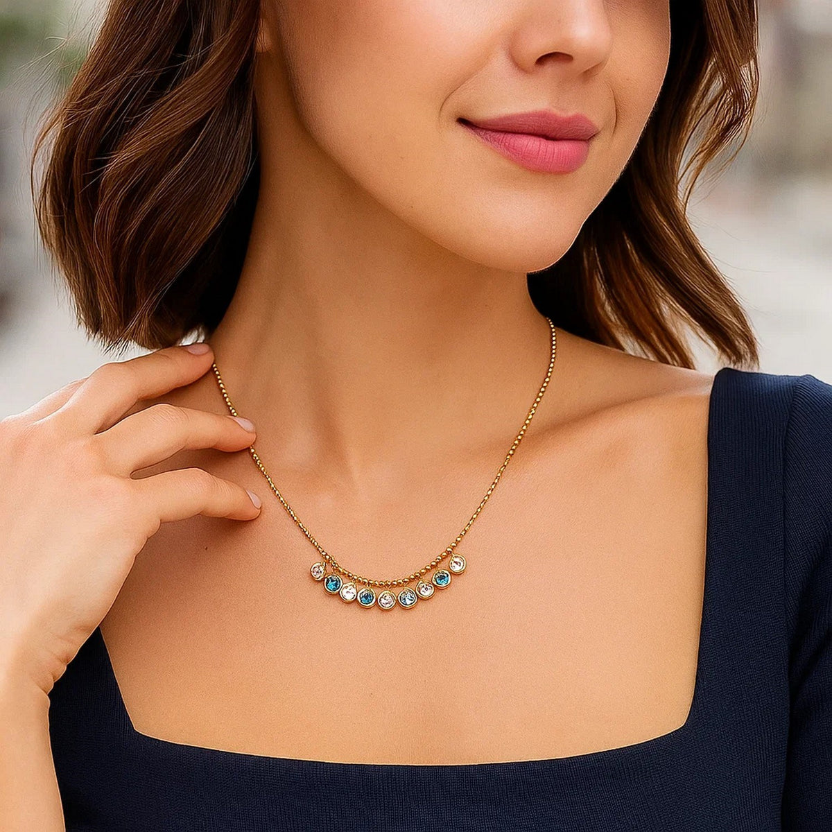 Blue and White Topaz Dancing Drop Necklace in 14K Yellow Gold, worn