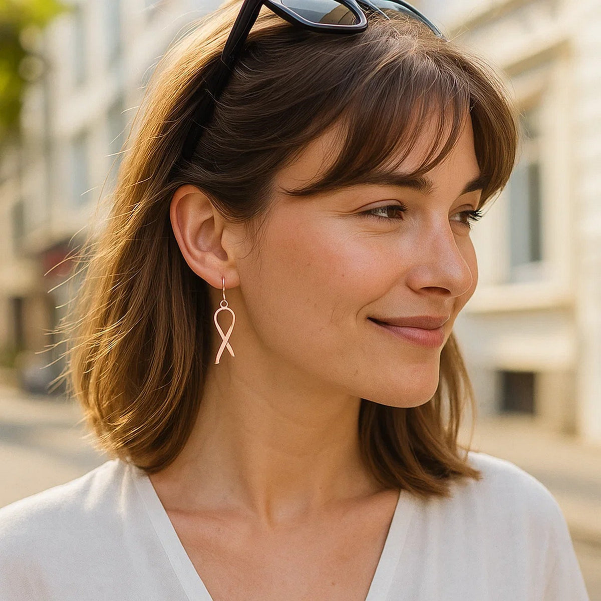 Looped Ribbon Drop Earrings in 14K Rose Gold, worn