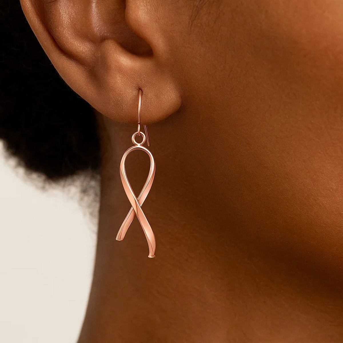 Looped Ribbon Drop Earrings in 14K Rose Gold, worn
