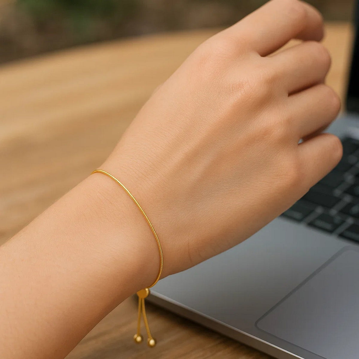 Adjustable Heart Bolo Bracelet in 14K Yellow Gold, worn