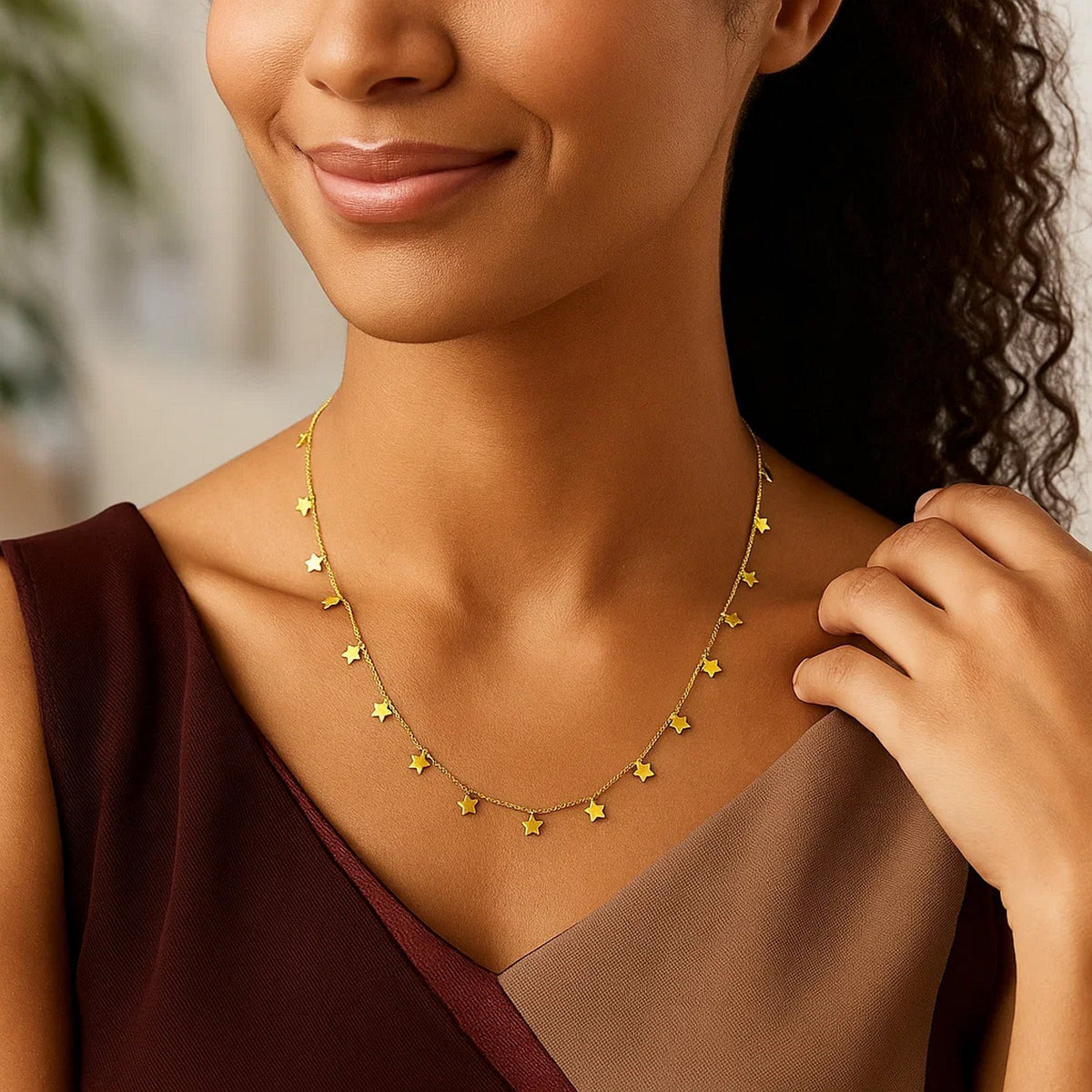 Dangling Stars Necklace in 14K Yellow Gold, worn