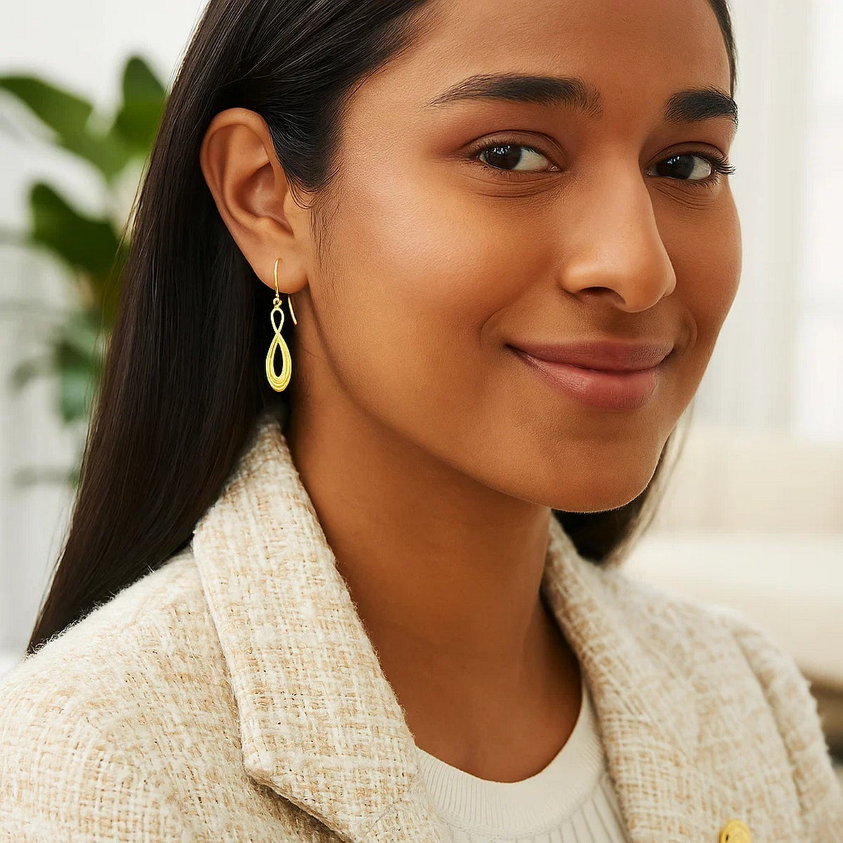Polished Infinity Drop Earrings in 14K Yellow Gold, worn