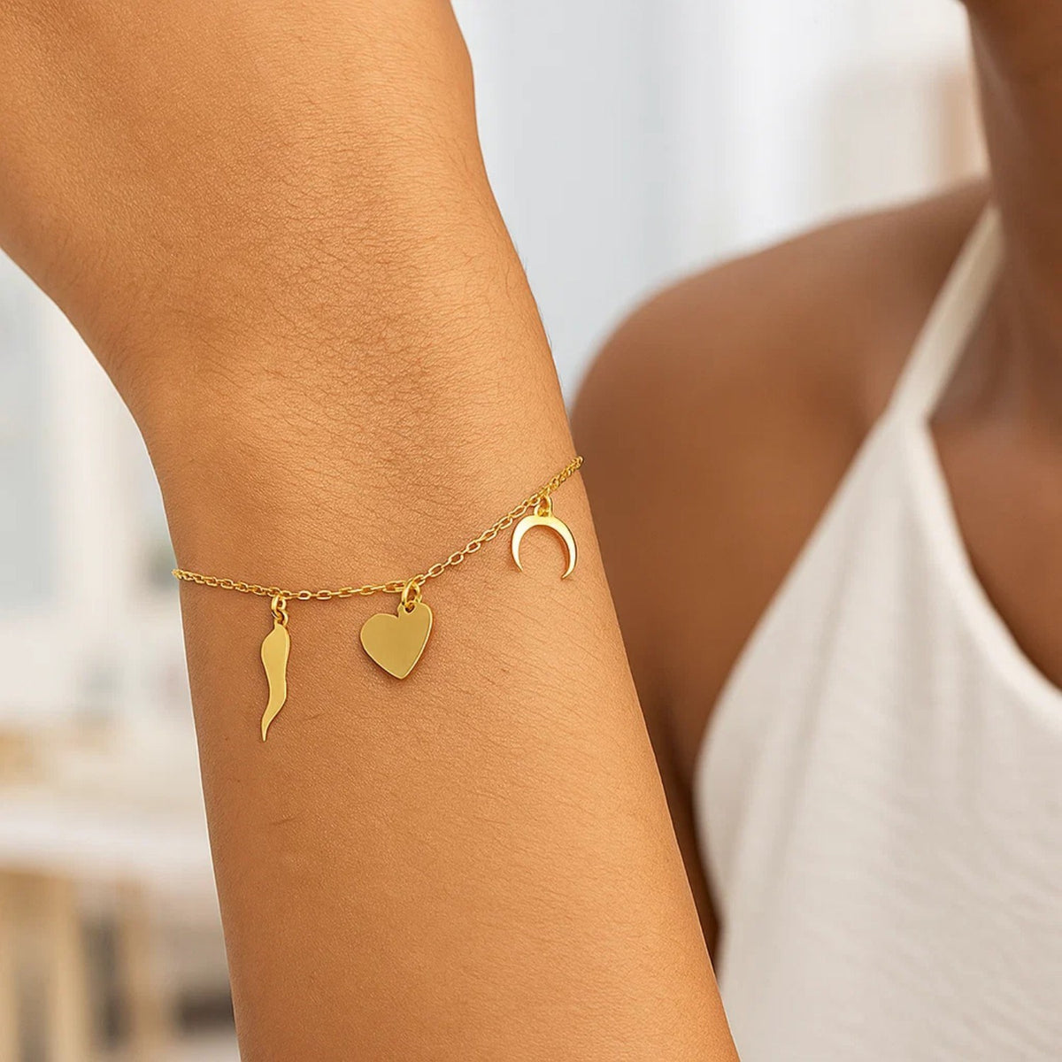 Good Luck Charm Bracelet in 14K Yellow Gold, worn