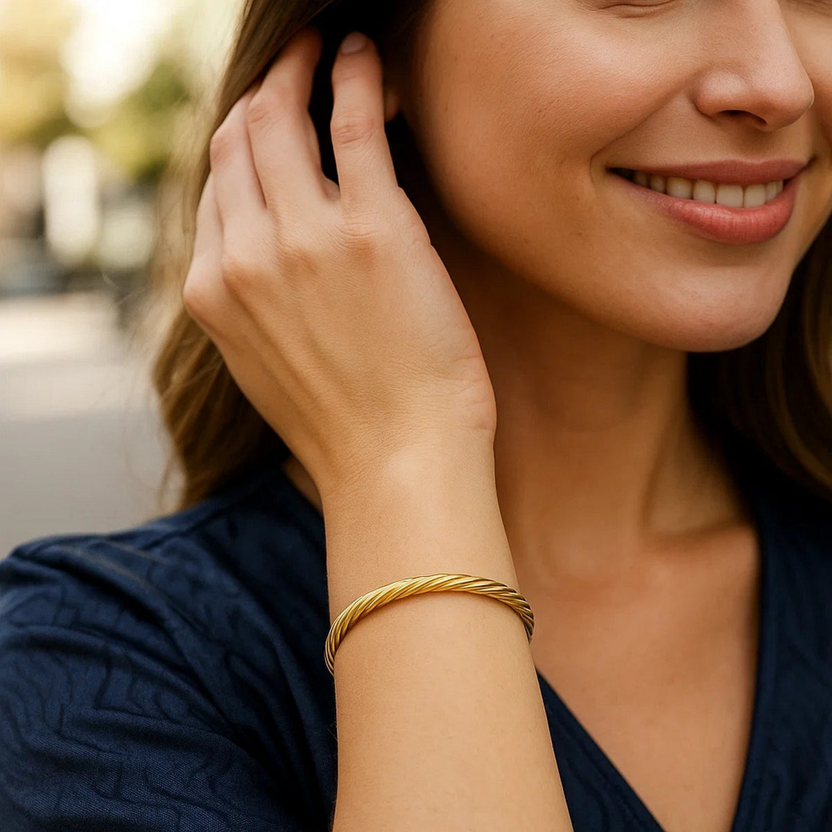 Fluted Twist Bangle in 14K Yellow Gold, worn