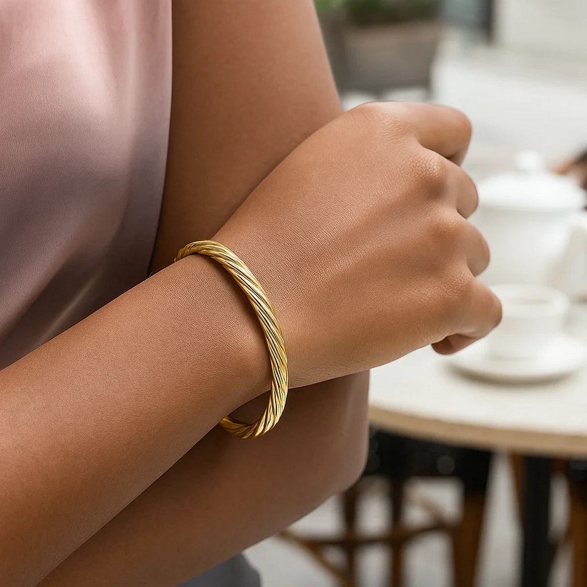 Fluted Twist Bangle in 14K Yellow Gold, worn