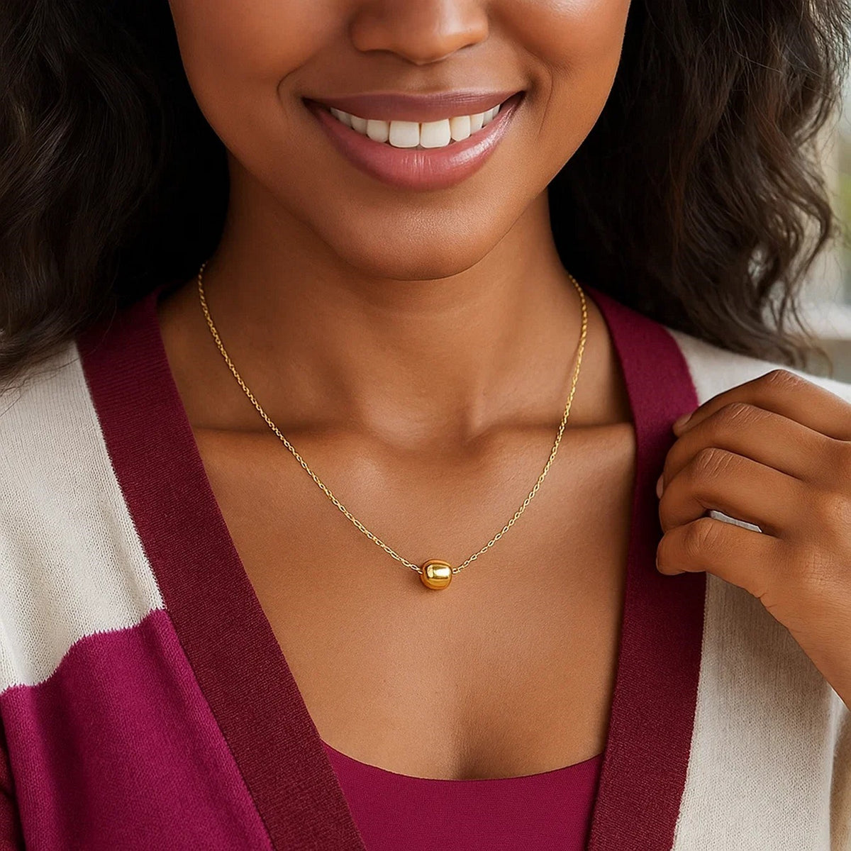 Polished Barrel Bead Necklace in 14K Yellow Gold, worn
