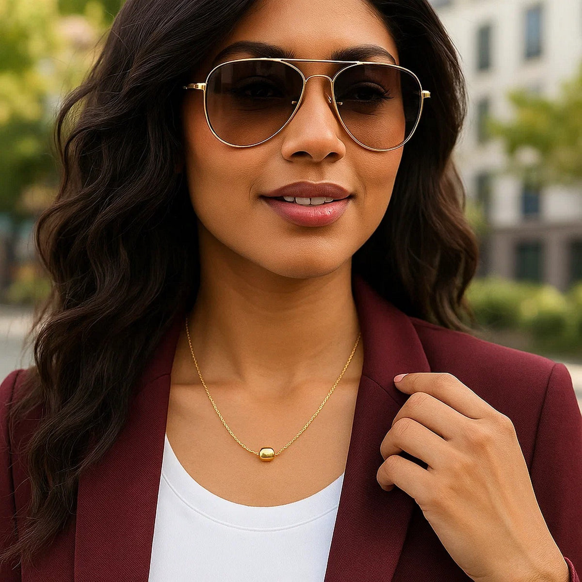 Polished Barrel Bead Necklace in 14K Yellow Gold, worn