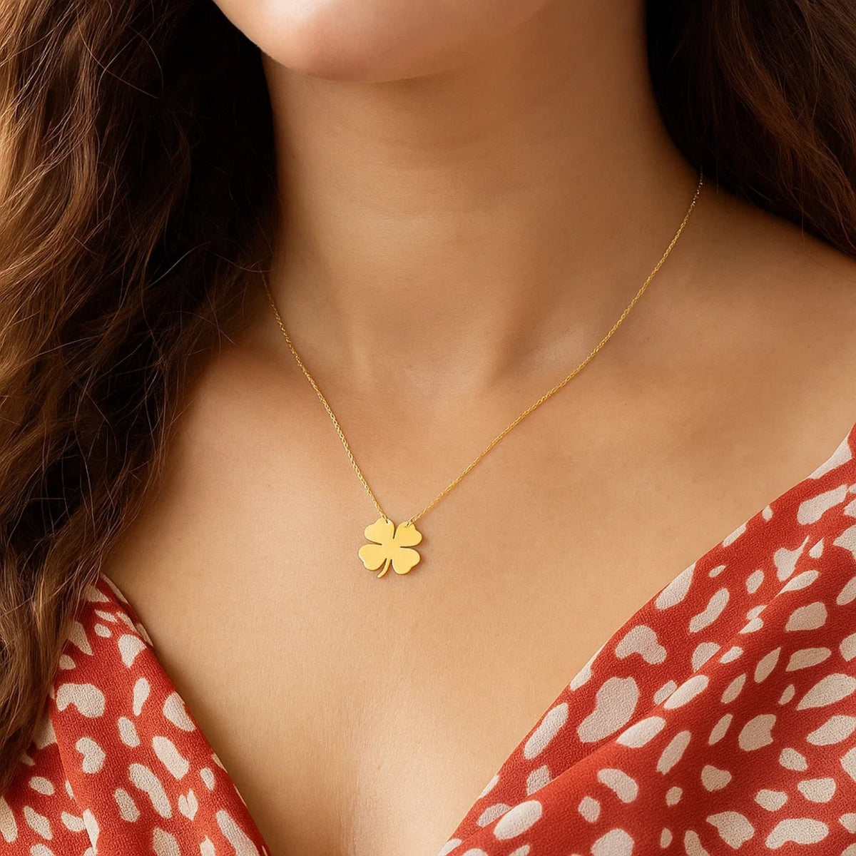 Polished Four Leaf Clover Necklace in 14K Yellow Gold, worn