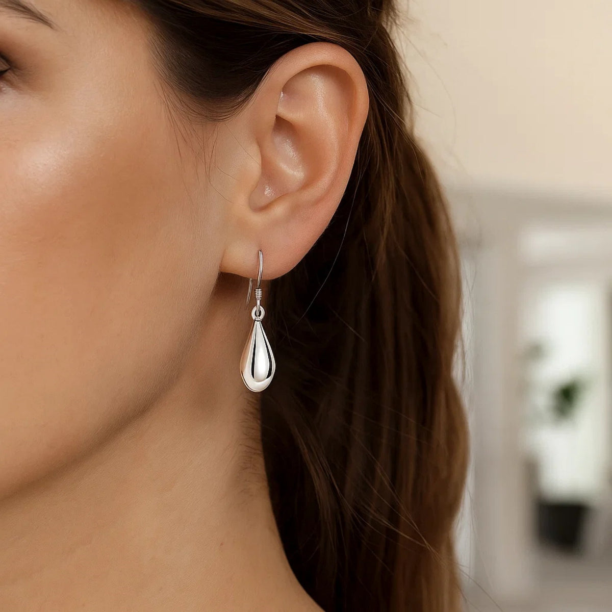 Polished Puffed Teardrop Dangle Earrings in Sterling Silver