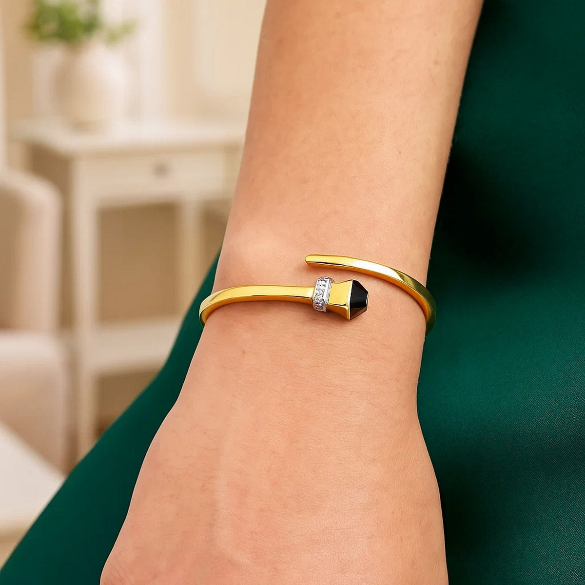 Black Onyx & Diamond Crossover Bangle in 14K Yellow Gold, worn