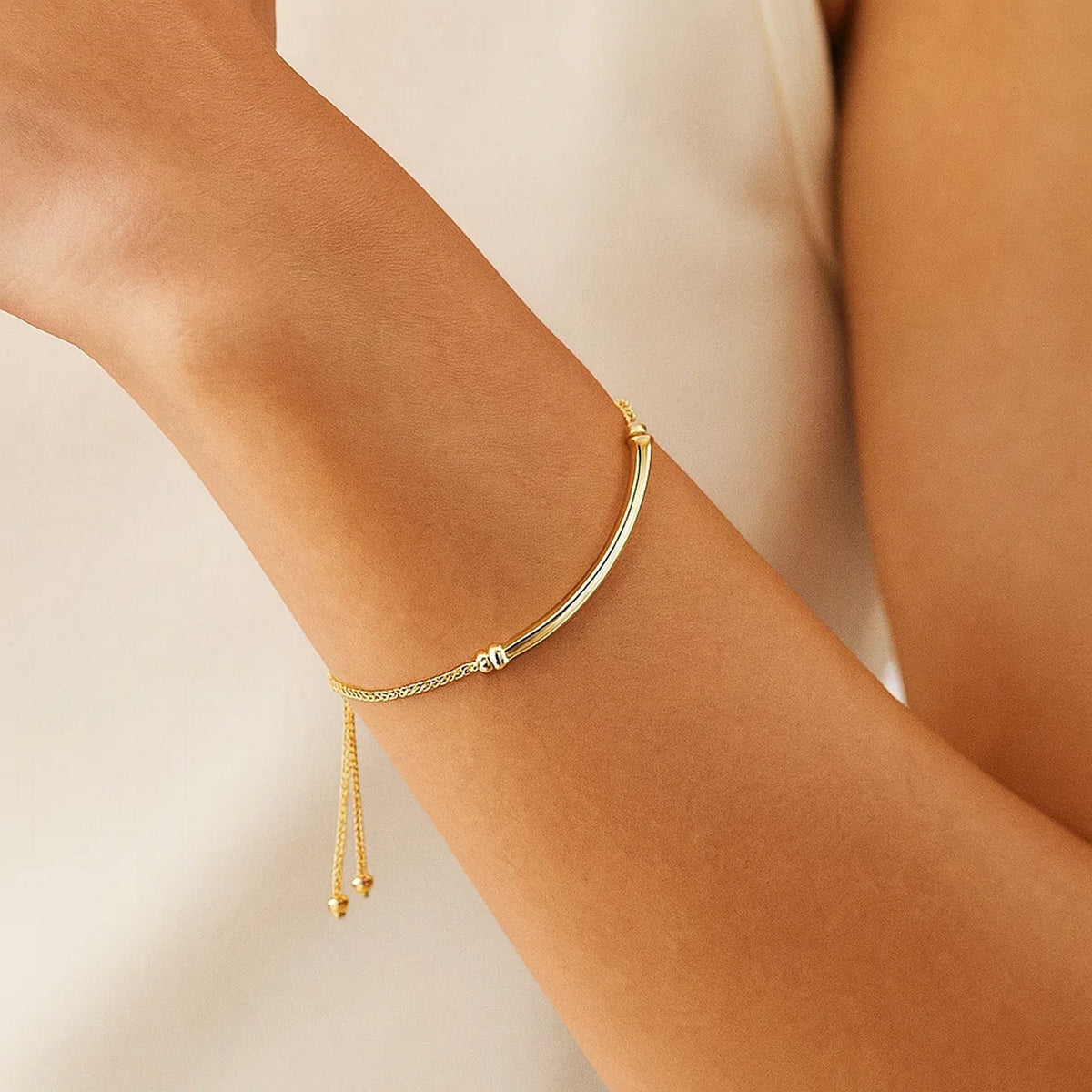 Curved Bar Adjustable Bracelet in 14K Yellow Gold, worn