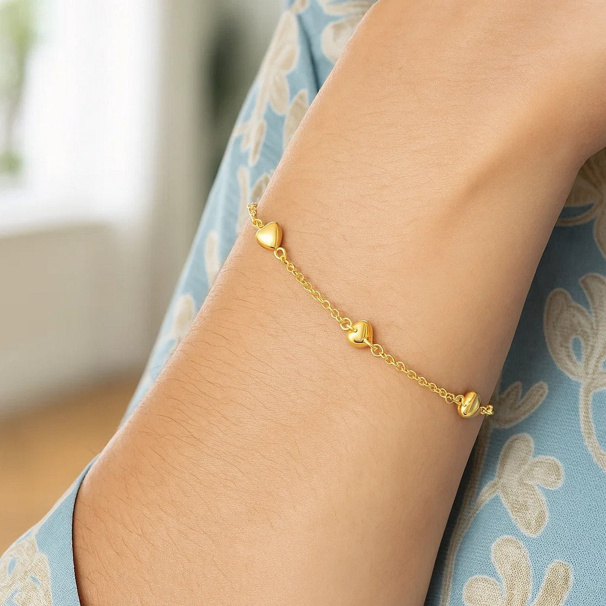 Puffed Heart Station Rolo Bracelet in 14K Yellow Gold, worn