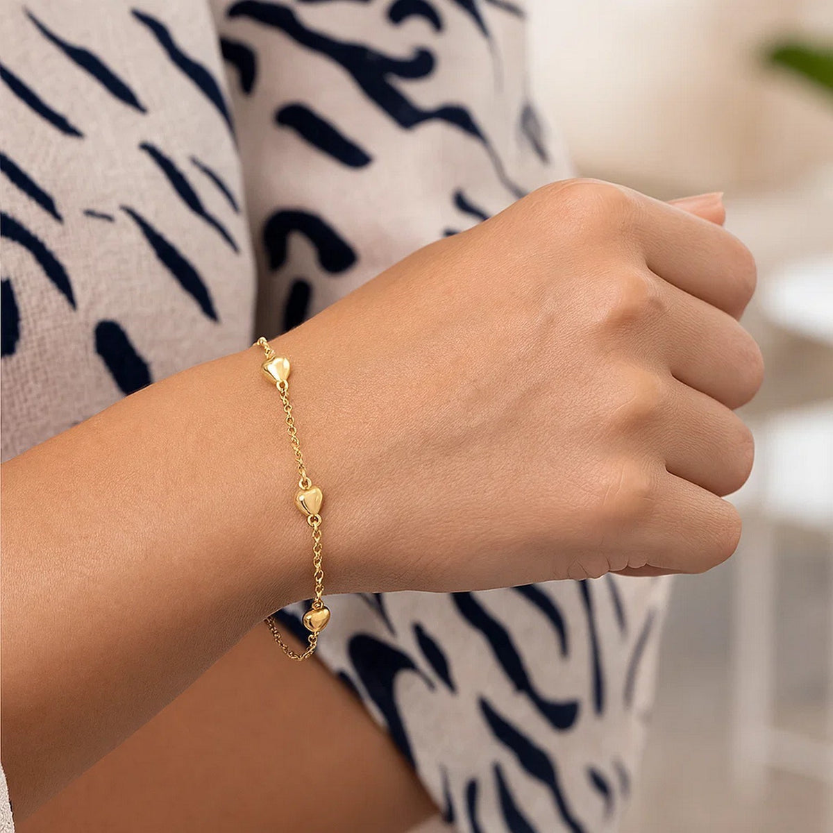 Puffed Heart Station Rolo Bracelet in 14K Yellow Gold, worn