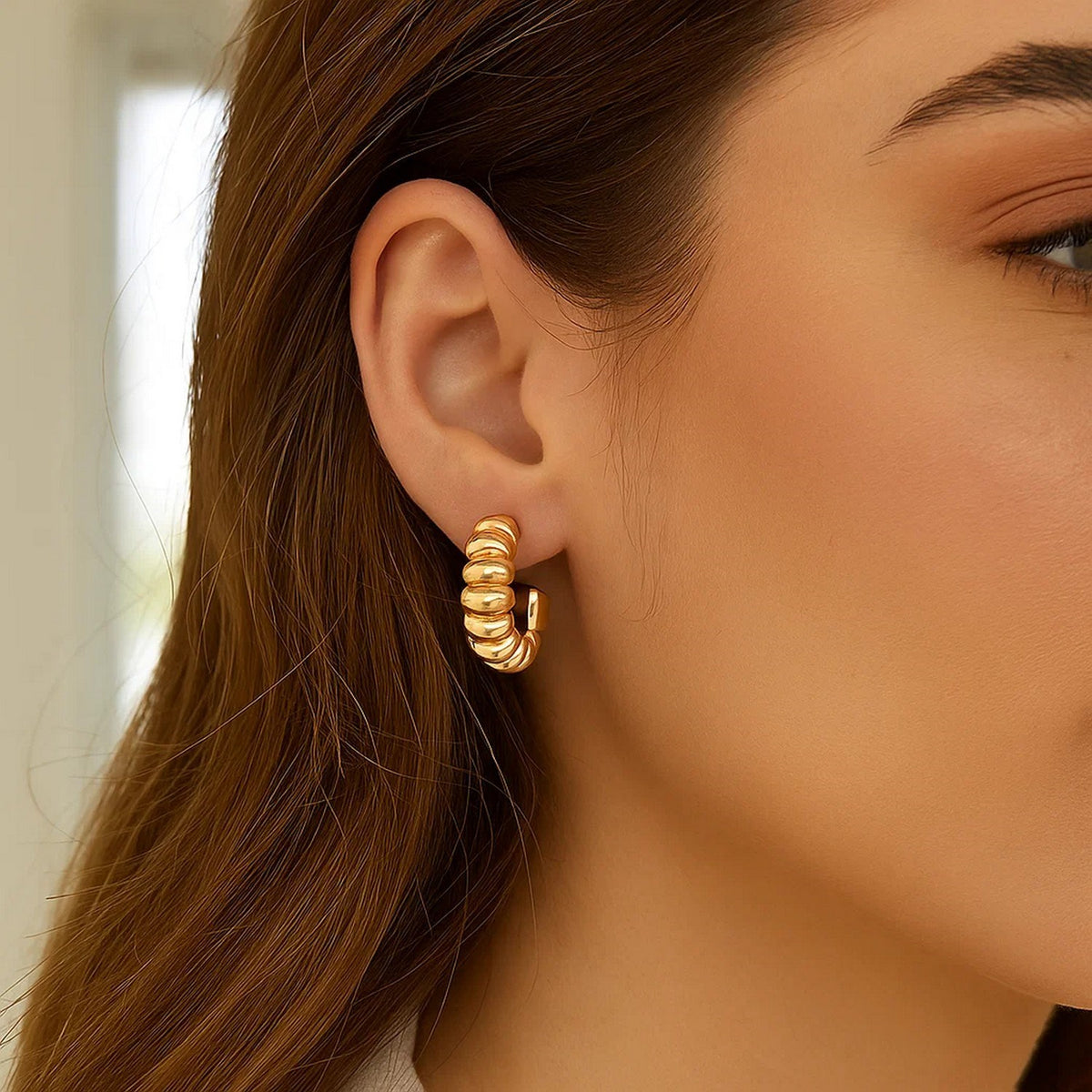 Twisted C-Hoop Earrings in Yellow Gold-Plated Sterling Silver