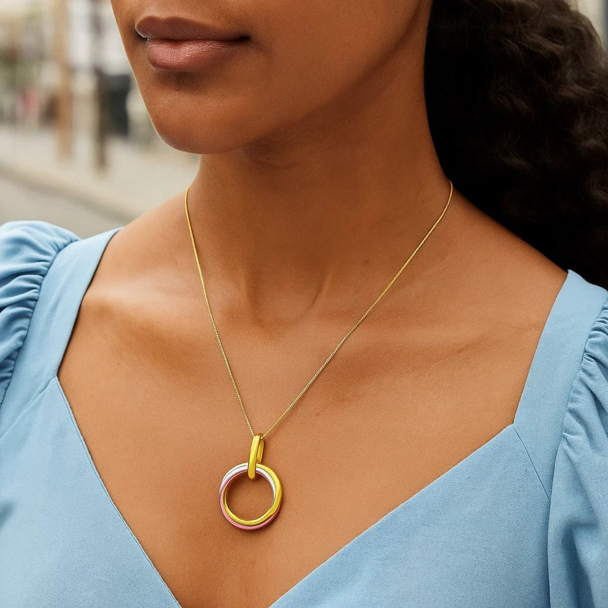 Interlaced Tri-Color Ring Pendant Necklace in 14K Gold, worn