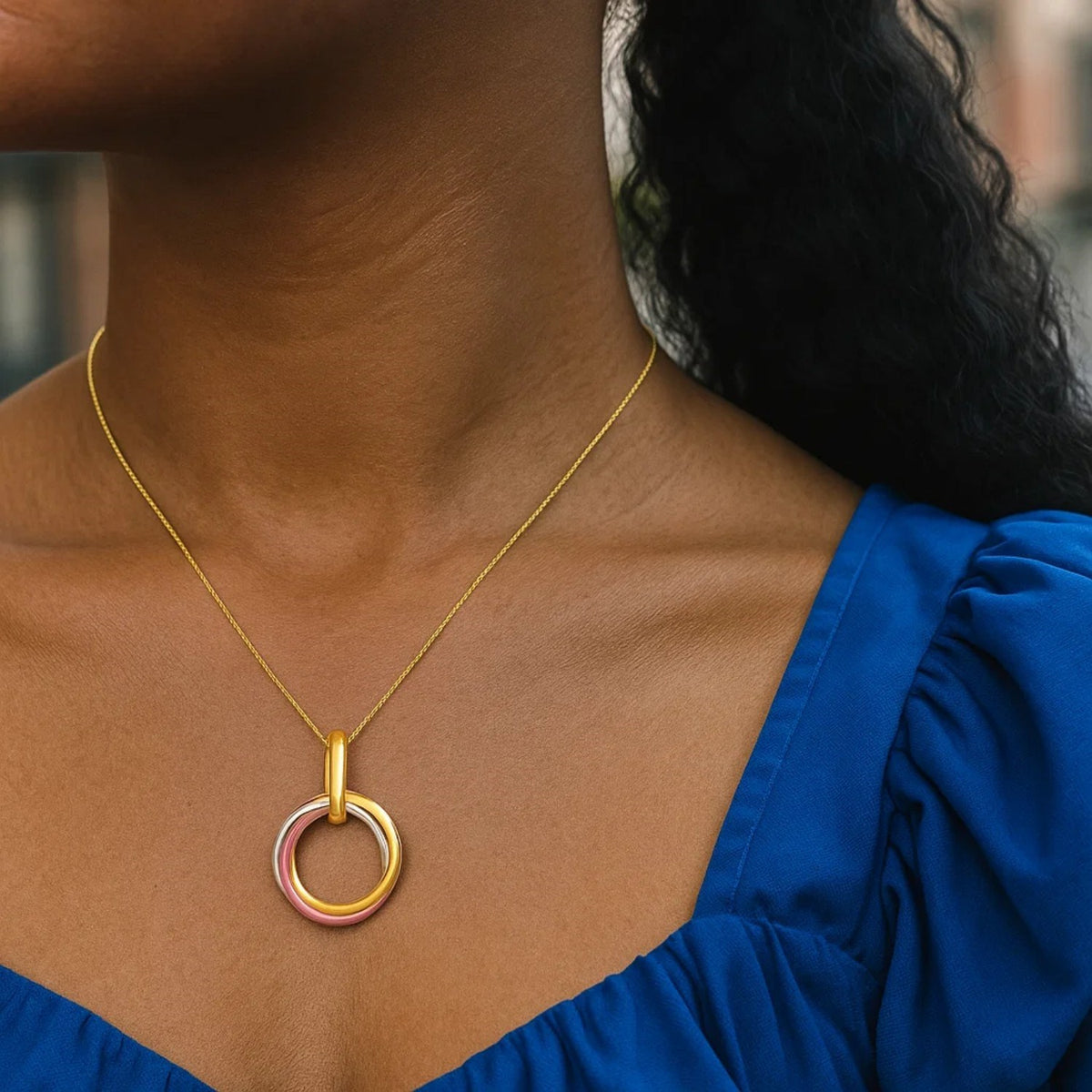 Interlaced Tri-Color Ring Pendant Necklace in 14K Gold, worn