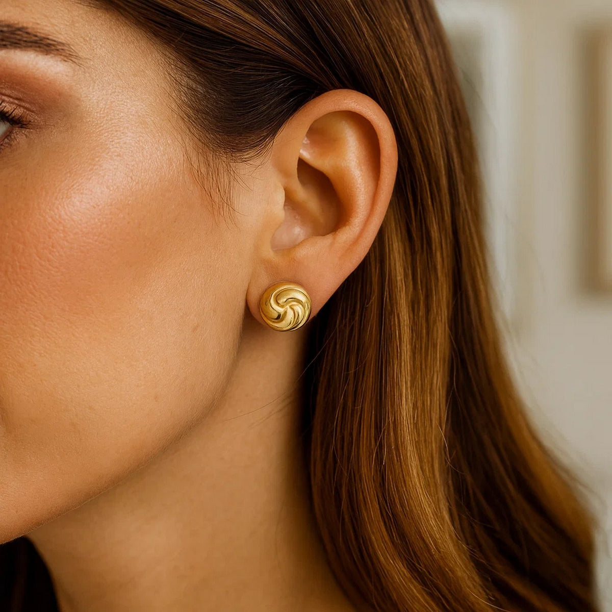 Puffed Swirly Knot Stud Earrings in Yellow Gold-Plated Silver