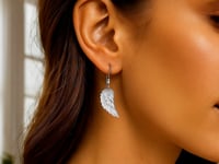 Textured Angel Wing Earrings in Sterling Silver — product video