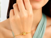 Adjustable Paw Print Bracelet in 14K Yellow Gold — product video