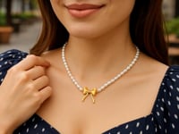 Pearl Strand Necklace with Gold Bow in 14K Yellow Gold — product video