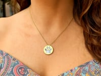 Mother of Pearl Paw Print Disc Necklace in 14K Yellow Gold — product video