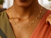Dangling Stars Necklace in 14K Yellow Gold — product video