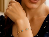 Blue Topaz Open Cuff Bangle in 14K Yellow Gold — product video