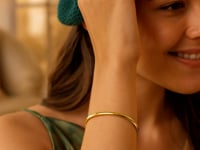 Dome Style Shiny Bangle in 10K Yellow Gold — product video