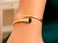Black Onyx & Diamond Crossover Bangle in 14K Yellow Gold (0.04 ct. tw.) — product video