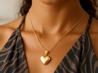 Puffed Heart Pendant Necklace in 10K Yellow Gold — product video